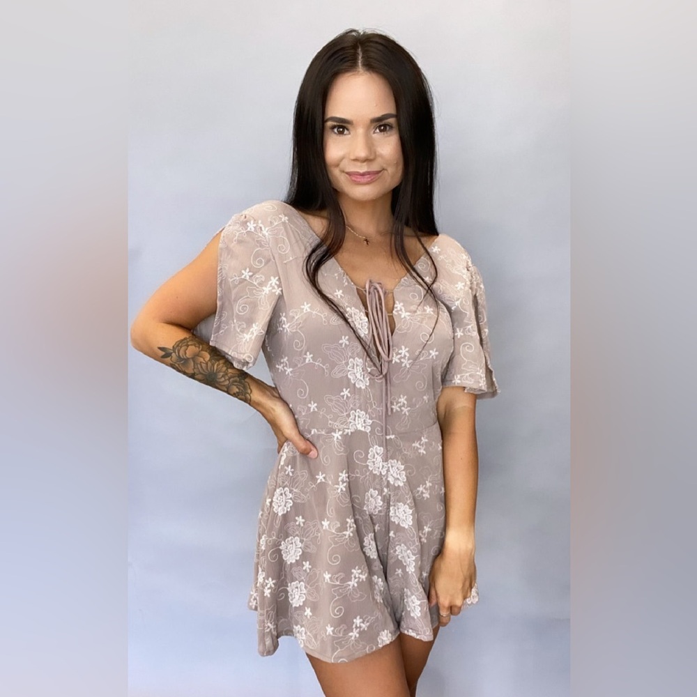 Embroidered Floral Lace-Up romper in Taupe